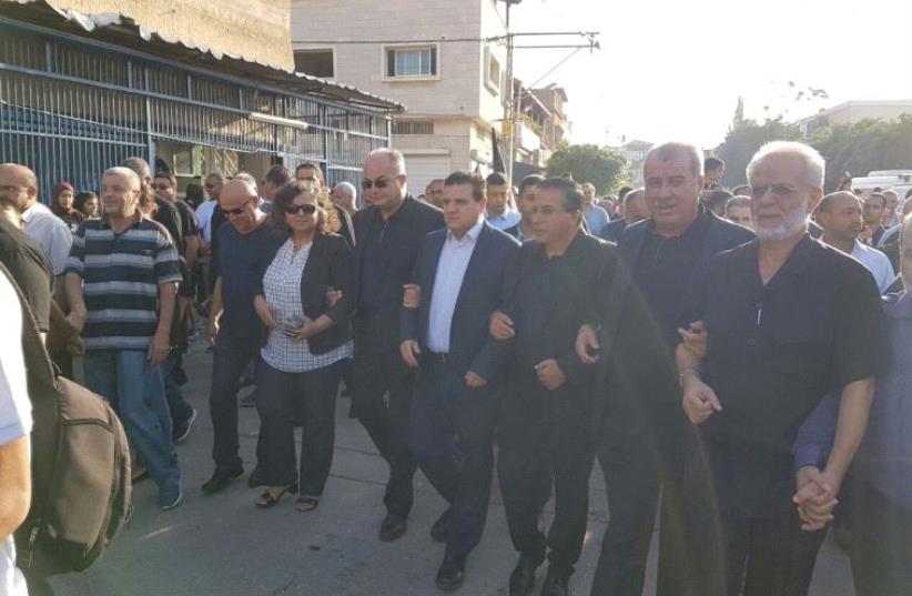 Joint list MKS participate in a march marking the 60th anniversary of the massacre in Kafr Kasim (photo credit: JOINT LIST)