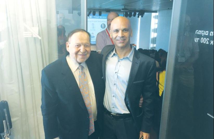 ROM HENDLER (right), founder and managing partner of InnoVel-Venture Capital, poses with American casino magnate Sheldon Adelson during a conference on tourism at the Peres Center for Peace in Tel Aviv last week (photo credit: ARIEL SHAPIRA)