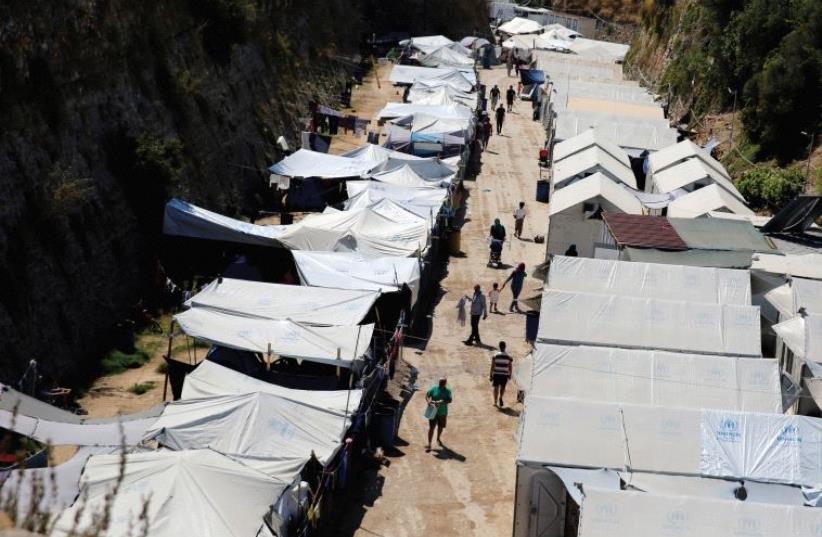 Migrant housing is seen on the Greek island of Chios (photo credit: REUTERS)