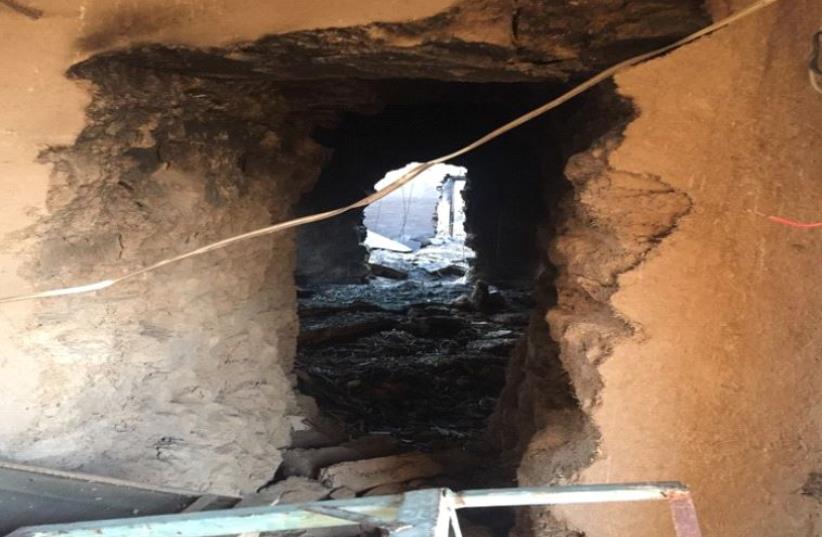 A tunnel in Wardak between buildings blasted by ISIS to conceal movement. (photo credit: SETH J. FRANTZMAN)