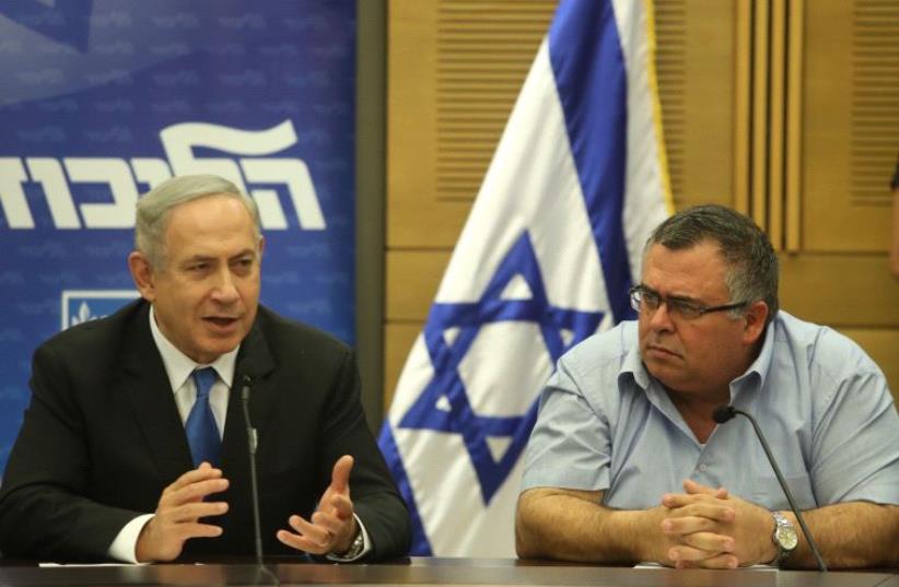 Prime Minister Benjamin Netanyahu and Likud MK David Bitan. (photo credit: MARC ISRAEL SELLEM/THE JERUSALEM POST)