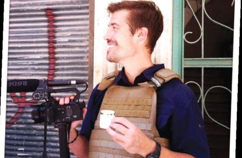 US PHOTOJOURNALIST James Foley, who was murdered by Islamic State in 2014. (photo credit: DOGWOOF)