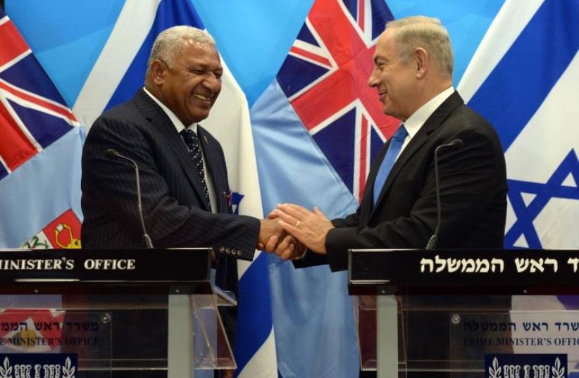 Prime Minister Benjamin Netanyahu with Fiji Prime Minister Frank Bainimarama (photo credit: HAIM ZACH/GPO)
