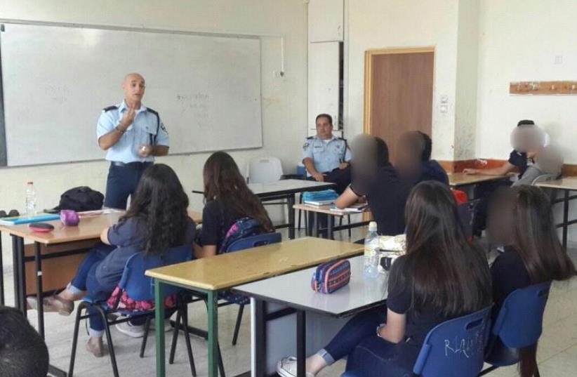 police lecture a class of elementary students (photo credit: COURTESY ISRAEL POLICE)