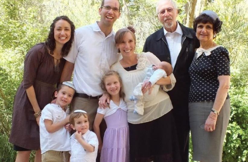 The writer (right) with her husband, Joe, and their family – (from left) daughter Elissa, son Josh, wife Elisheva and their four children – shortly before making aliya (photo credit: Courtesy)