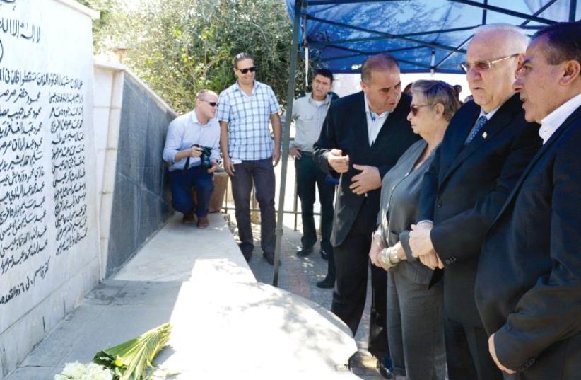 President Reuven Rivlin participates in the 2014 memorial ceremony commemorating the Kafr Kasim massacre (photo credit: Mark Neiman/GPO)