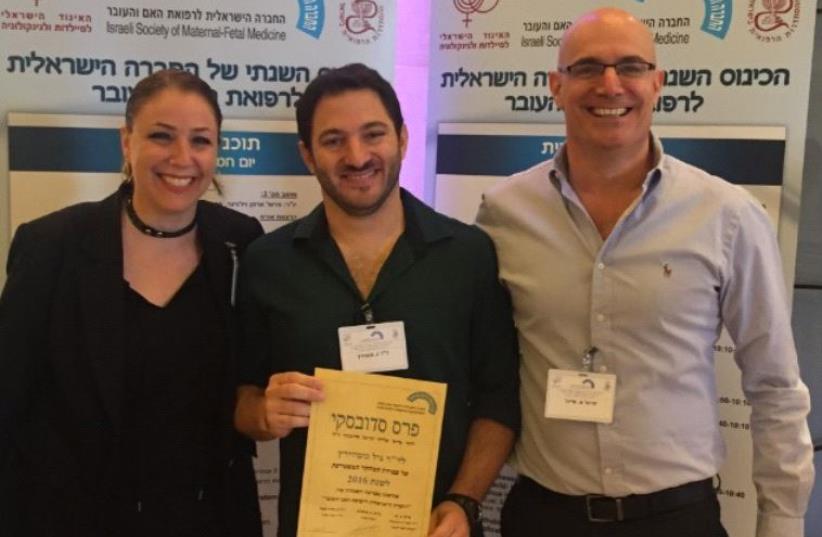 (From left) Dr. Asnat Walfisch, Dr. Gil Gutwirtz and Prof. Eyal Sheiner and with their prize. (photo credit: BGU)