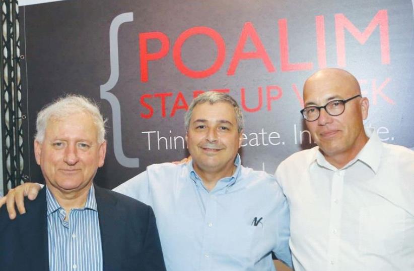 AT THE opening of Poalim Start-up Week in Tel Aviv on Sunday are (from left) Harel Ifhar, general manager of Amazon Web Services Israel; Bank Hapoalim chairman Yair Seroussi, CEO Arik Pinto and Avi Kochva, director of its Innovation Division.  (photo credit: SIVAN FARAG)