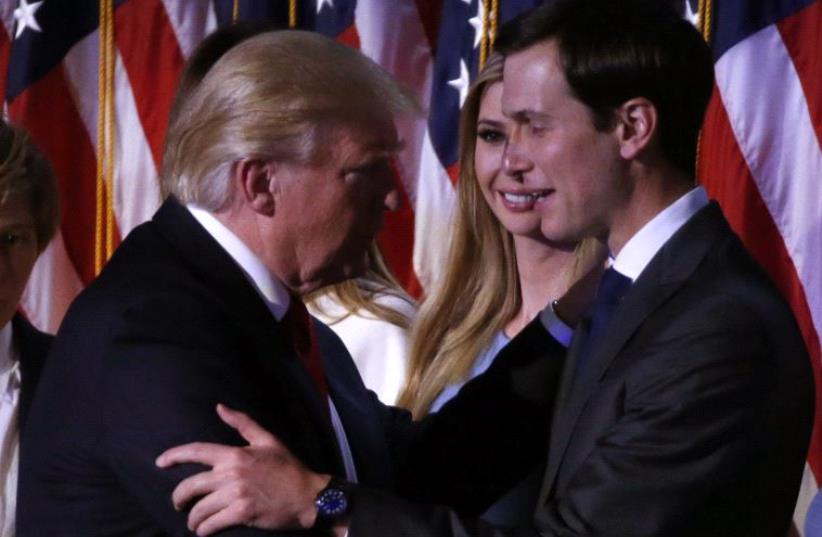 Donald Trump greets his daughter Ivanka and son in law Jared Kushner (R) at his election night rally in Manhattan, New York, November 9, 2016 (photo credit: REUTERS)