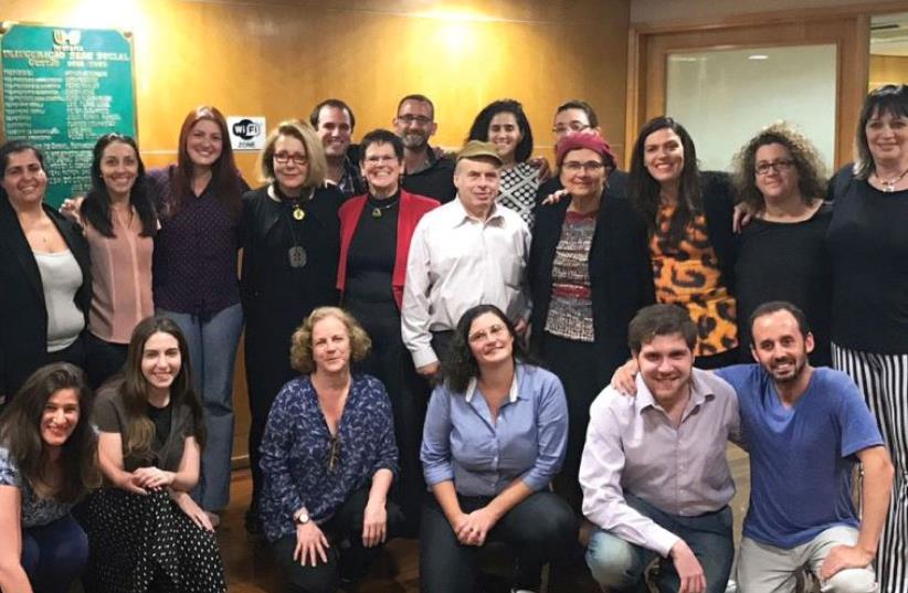JEWISH AGENCY chairman Natan Sharansky, the agency’s Brazil head Revital Poleg (on his right) and agency emissaries and staff smile in Sao Paulo last week (photo credit: ANDRE YERUSHALMI)