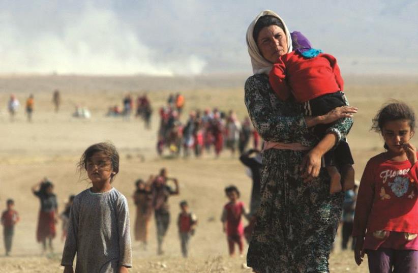 La minorité yazidie, victime des exactions de l’Etat islamique (photo credit: REUTERS)