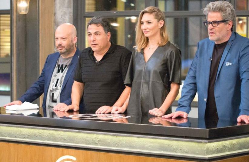 THE ‘MASTER CHEF’ judges – (from left) Yonatan Roshfeld, Haim Cohen, Michal Ansky and Eyal Shani – are ready to start eating. (photo credit: MAKO)