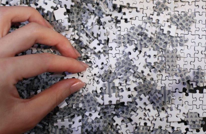 ‘SO FAR only half the puzzles I ordered have arrived, but the experience has been fascinating, though nerve-racking.’ (photo credit: REUTERS)