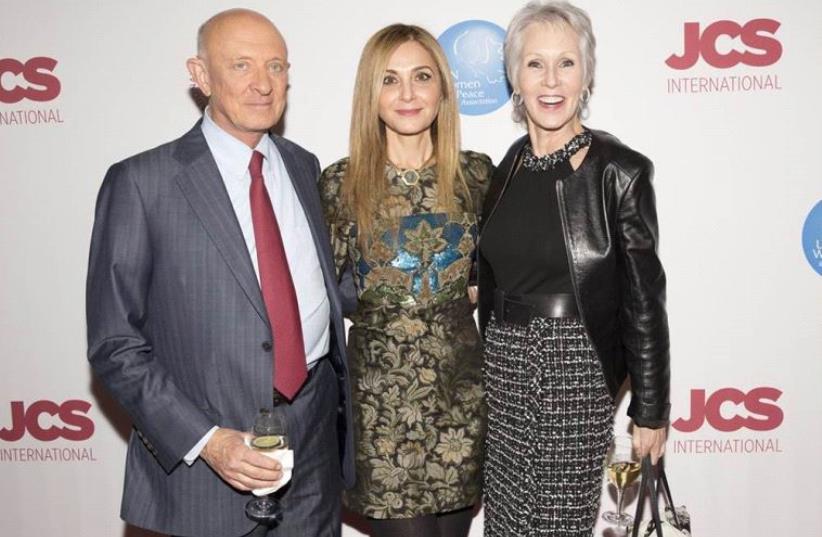 Michal Grayevsky, president of Jerusalem Capital Studios and JCS International (center), is flanked by former CIA Director James Woolsey and his wife Nancye at a cocktail party for the opening of the International Emmy World Television Festival.  (photo credit: courtesy)