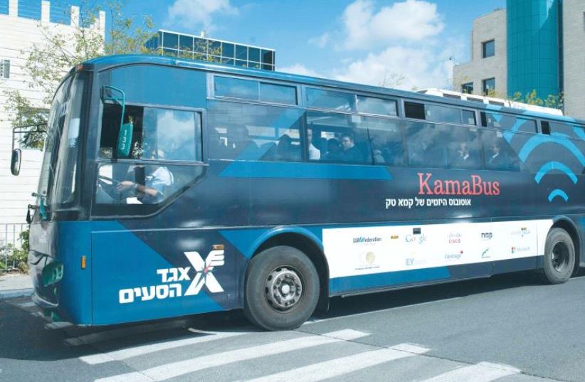 ULTRA-ORTHODOX participants take a ride last week on KamaTech’s entrepreneur bus. Their trip took them to leading hi-tech entrepreneurs, investors and developers. (photo credit: COURTESY KAMATECH)