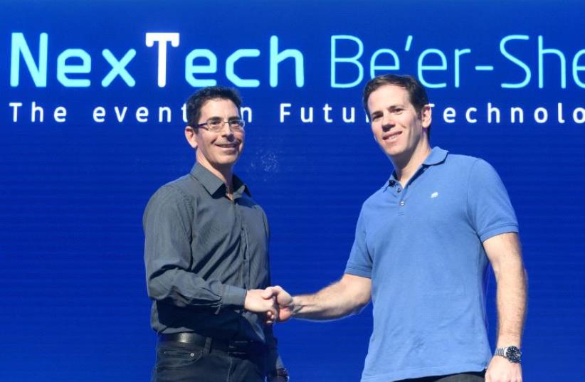 Netta Cohen, BGN Technologies CEO (left), and Matan Parnes, PayPal's General Manager in Israel (photo credit: DANI MACHLIS/BGU)