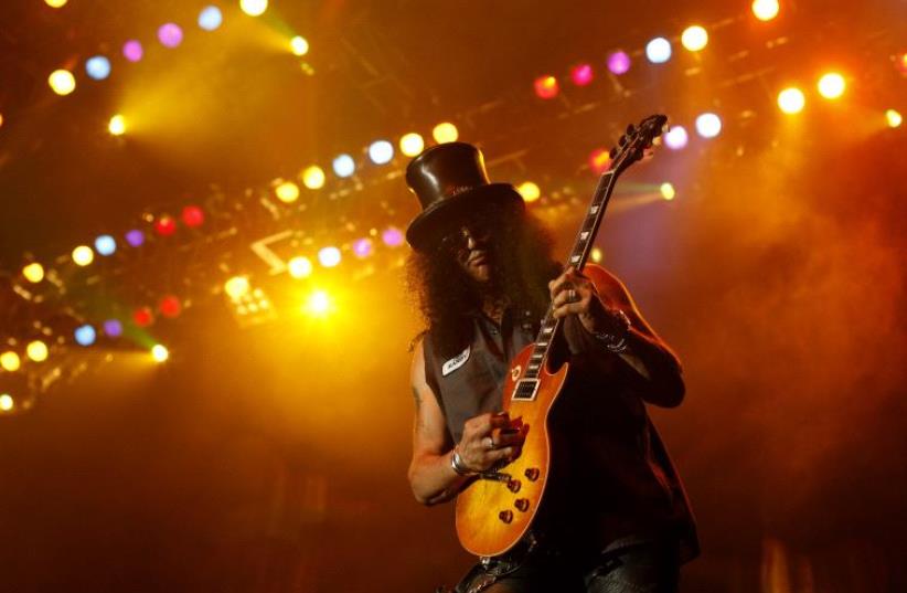Former Guns N' Roses guitarist Saul Hudson, better known by his stage name Slash (photo credit: REUTERS)