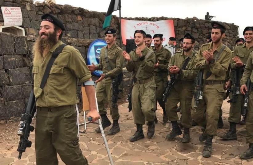 Mendy Boteach and his Unit Receiving their "Warrior Pins" on Har Bental in the Golan Heights (photo credit: SHMULEY BOTEACH)