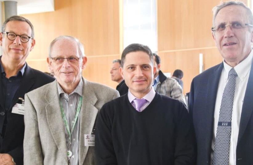 PARTICIPANTS IN yesterday’s workshop on cyber security in tomorrow’s medical world pose at Ben-Gurion University in Beersheba. From left: Roni Zehavi, Dr. Ehud Davidson, Mayor Ruvik Danilovich and Prof. Amos Katz. (photo credit: DANI MACHLIS)