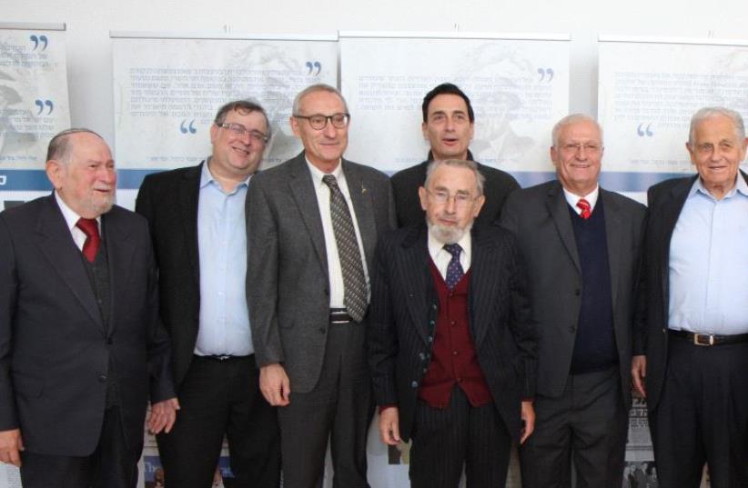 Among the dignitaries attending the opening of the Elie Wiesel Memorial Exhibition at the Hebrew University of Jerusalem's Mandel School for Advanced Studies in the Humanities on Tuesday were Rabbi Menachem Hacohen, Prof. Aviad Hacohen, Prof. Menachem Ben-Sasson, Prof. David Weiss Halivni (front), M (photo credit: GIDI ABRAHAM)
