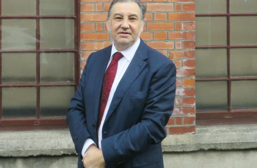 Maurice Cohen, head of the local community in Dublin, stands outside the Irish Jewish Museum in the city (photo credit: Courtesy)