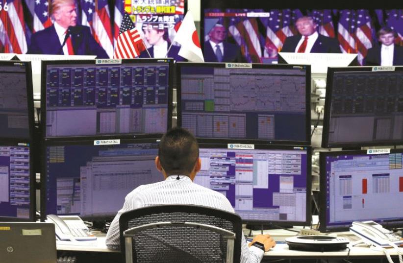 Les marchés boursiers ont réagi nerveusement au lendemain des élections présidentielles américaines (photo credit: REUTERS)