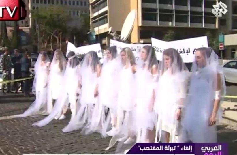 Women protest Lebanese law absolving rapists who marry victims. (photo credit: screenshot)