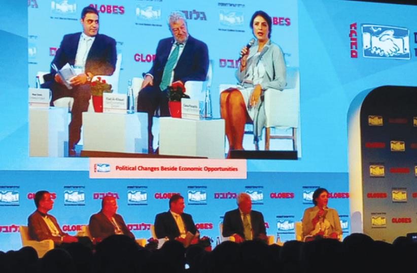 PANELISTS at yesterday’s Globes Israel Business conference in Tel Aviv listen to a presentation.  (photo credit: MICHAEL ZEFF)