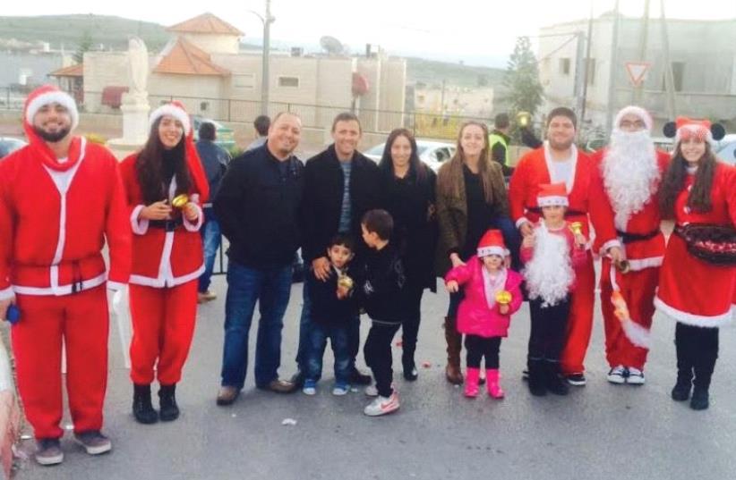 Santas lend festive cheer to the Galilee (photo credit: SEFI MAKLEDA)