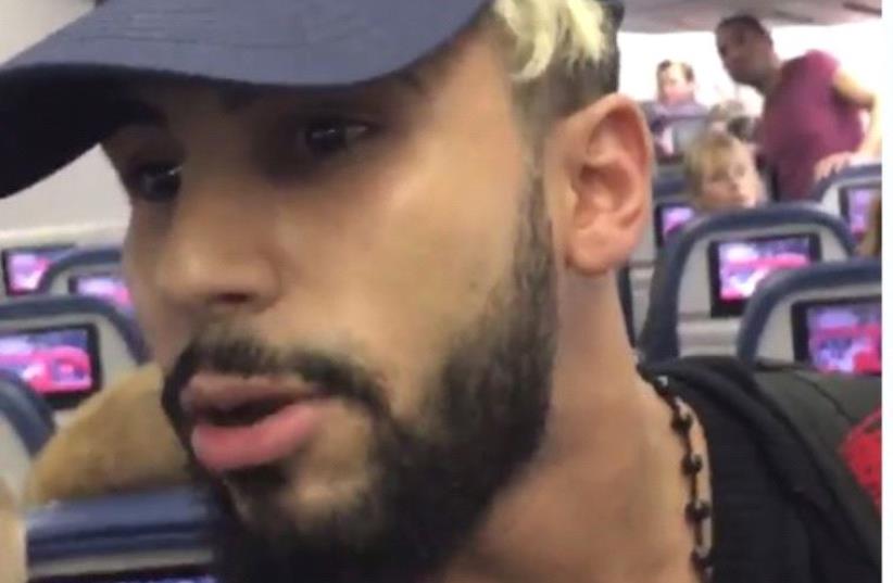 Still from Adam Saleh footage of alleged removal from a Delta Air Lines flight (photo credit: screenshot)