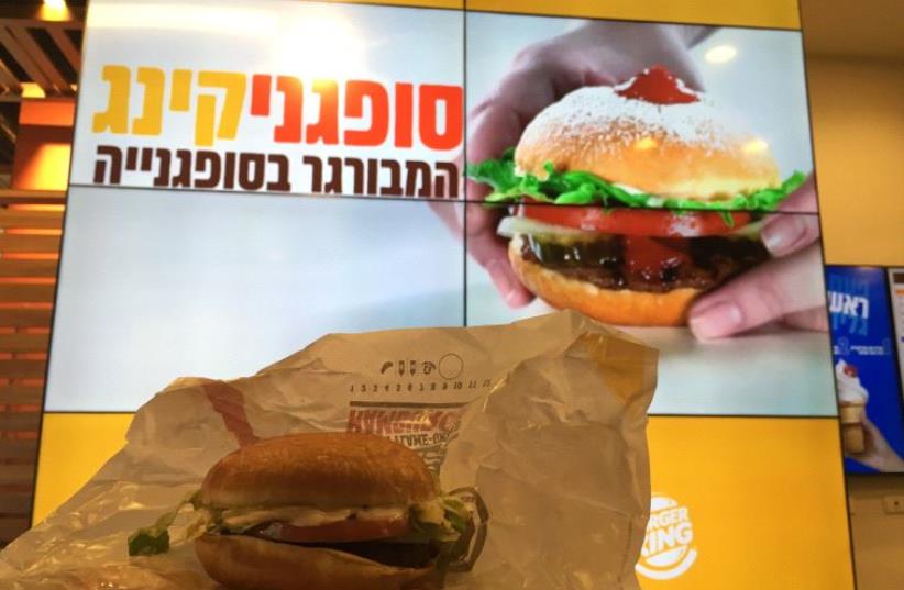The Sufganiking, a special sufganiya burger for Hanukka, at a Burger King restaurant in Tel Aviv (photo credit: ELIYAHU KAMISHER)