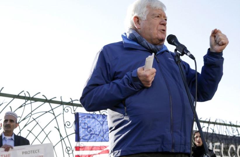 Democratic US Rep. Jim McDermott speaks at a pro-refugee protest organized by Americans for Refugees and Immigrants in Seattle, Washington November 28, 2015 (photo credit: REUTERS)