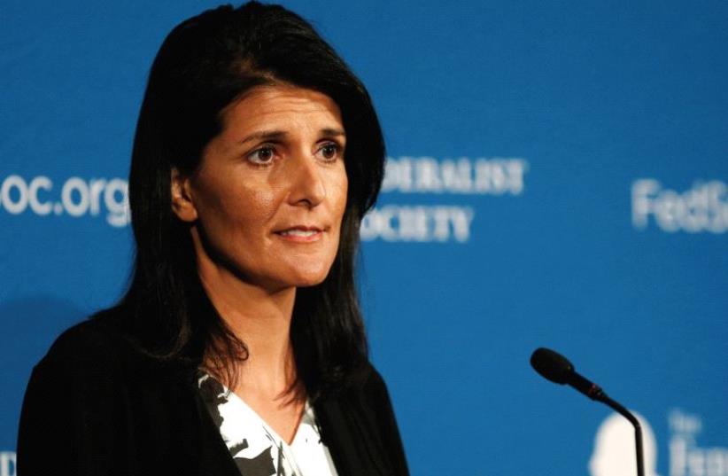 Nikki Haley delivers remarks at the Federalist Society 2016 National Lawyers Convention in Washington DC in November, 2016 (photo credit: REUTERS/GARY CAMERON)