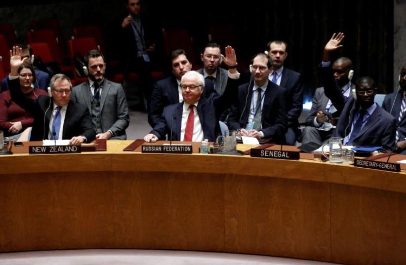 Members vote on a resolution at the UN Security Council in New York (photo credit: REUTERS)