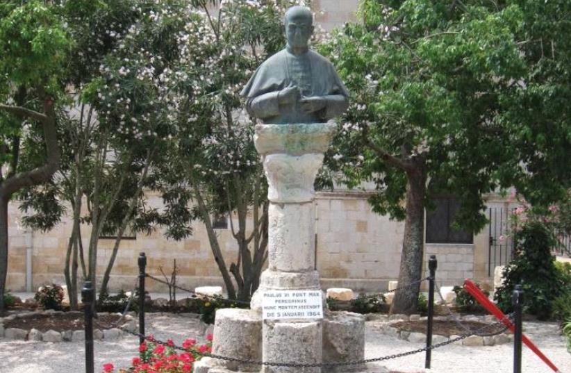 A statue near the Church of the Transfiguration on Mount Tabor marking Pope Paul VI’s visit to the Holy Land. (photo credit: Wikimedia Commons)