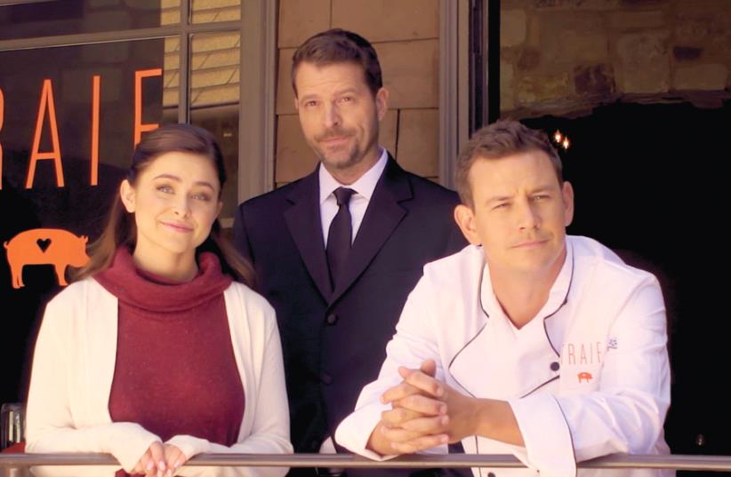 JASON (CASEY GRAF), Philippe (Michael Wouters) and Jackie (Gianna Didonato) pose outside the restaurant Traif. (photo credit: Courtesy)
