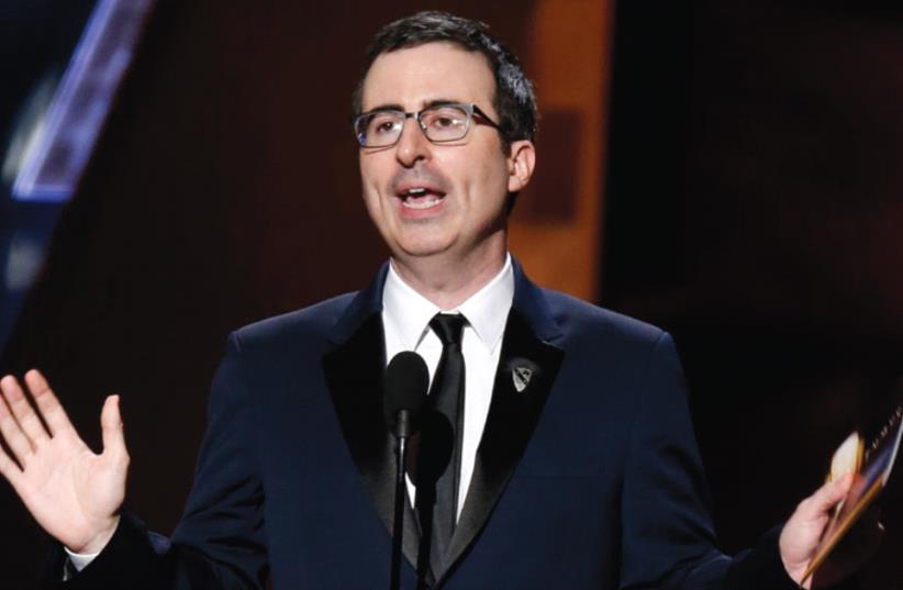 JOHN OLIVER at the 67th Primetime Emmy Awards in Los Angeles. (photo credit: REUTERS)
