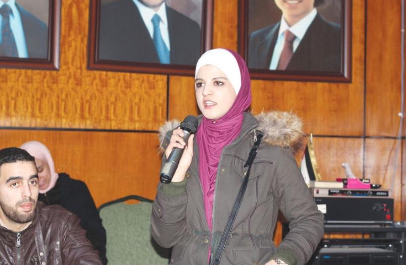 A STUDENT ADDRESSES the conference on Hebrew studies in Amman on December 22 (photo credit: CENTER FOR ISRAEL STUDIES-AMMAN)