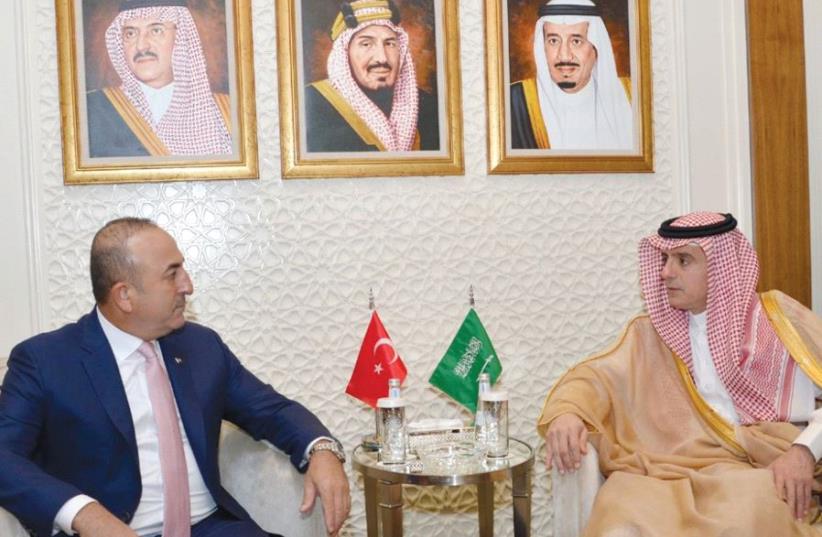 SAUDI ARABIAN Foreign Minister Adel al-Jubeir (right) meets Turkish Foreign Minister Mevlut Cavusoglu in Riyadh 2016 (photo credit: SAUDI PRESS AGENCY/REUTERS)