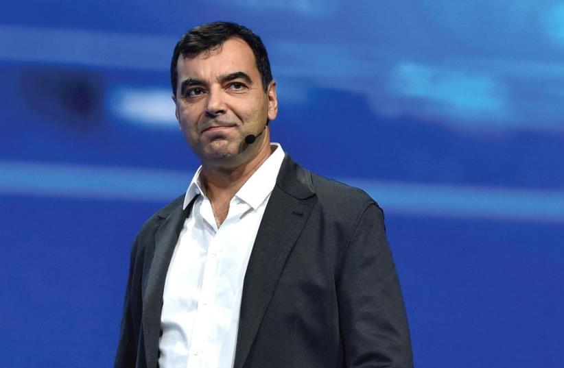 Mobileye co-founder Amnon Shashua speaks at a press event at CES in Las Vegas, January 5, 2016 (photo credit: AFP PHOTO)