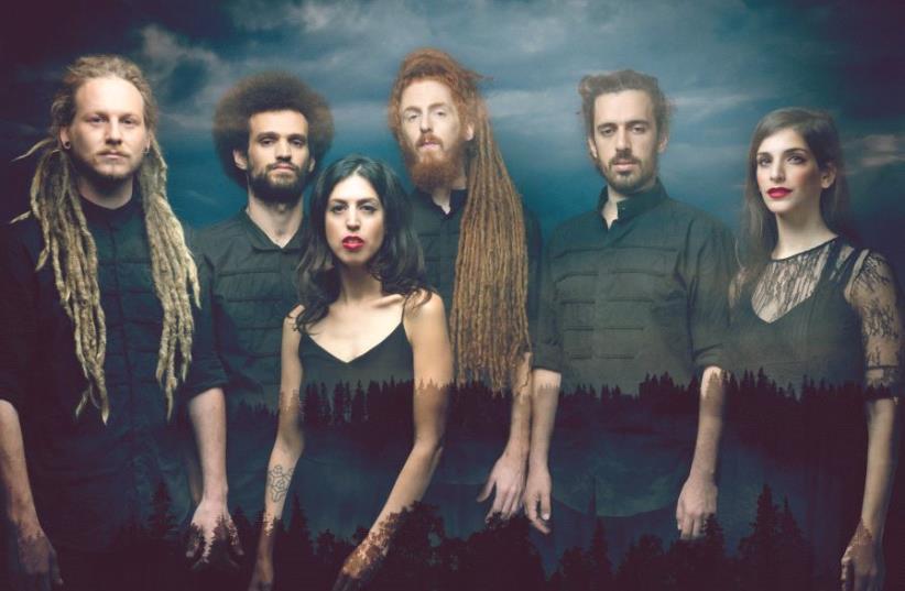 ‘OUR CONCERT is like a ceremony. It has a storyboard. We welcome the audience into the forest... We deal with love, attachment, death, fear, and then we connect to the heart,’ says Forest frontwoman Orka Teppler (center), seen here with the rest of the band (photo credit: JUDE MOSCOVITCH)