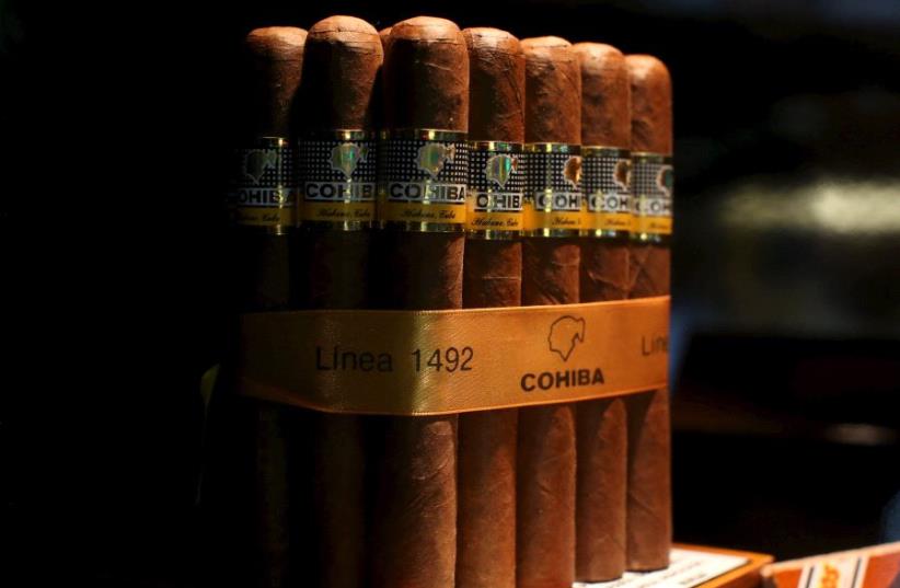 Cohiba cigars are seen on display at the XVIII Habanos Festival in Havana (photo credit: REUTERS)