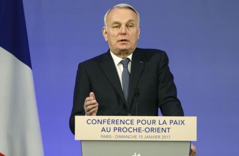 French Minister of Foreign Affairs Jean-Marc Ayrault addresses delegates at the opening of the Mideast peace conference in Paris, January 15, 2017 (photo credit: REUTERS)