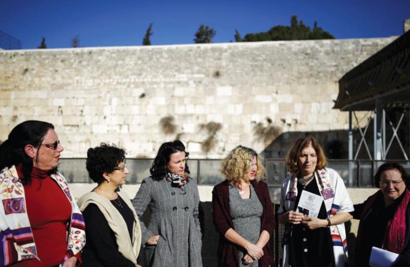 MEMBERS OF 'Women of the Wall' including the author (second from right) speak to the media following the Israeli government's decision last year (photo credit: REUTERS)