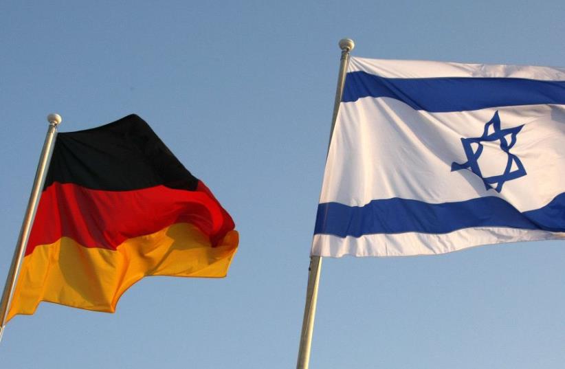 German and Israeli national flags  (photo credit: REUTERS)