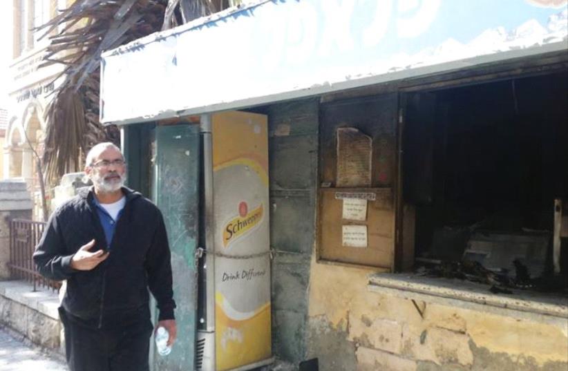 At the burnt-out site of Oved’s Falafel on Bethlehem Road (photo credit: FACEBOOK)