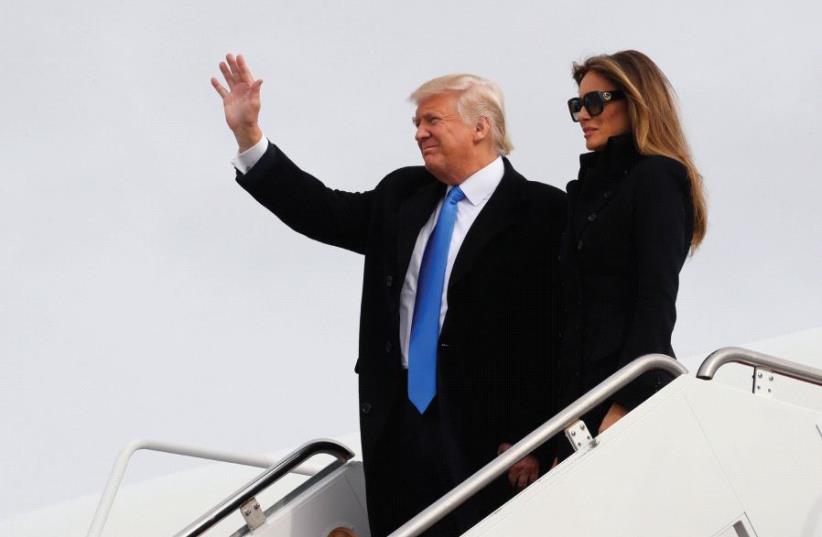 Donald Trump and his wife, Melania, arrive at Joint Base Andrews outside Washington (photo credit: REUTERS)