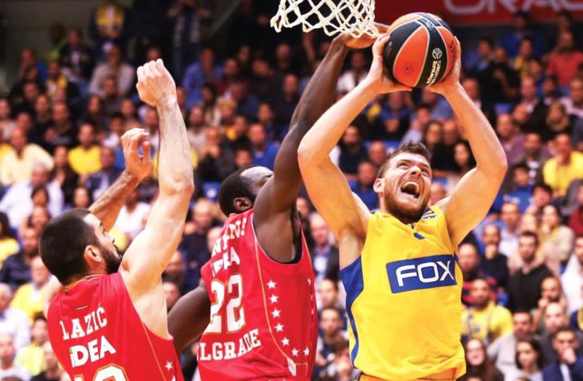 Maccabi Tel Aviv guard Gal Mekel (right) started for just the third time in the Euroleague this season, but had just three points to go with three turnovers in a 71-67 home defeat to Red Star Belgrade. (photo credit: DANNY MARON)