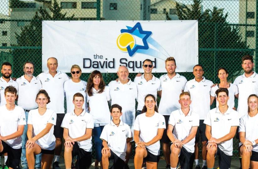 Adam Coffer (top row, fifth from right, with the players and staff of the David Squad) believes sport, and tennis in particular, can serve as a great tool to show the true face of Israel to the world. (photo credit: GILAD KAVALERCHIK)
