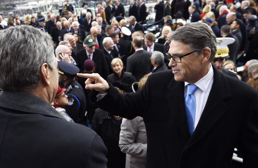 US Energy Secretary nominee Rick Perry leaves after the Presidential Inauguration of Donald Trump on January 20, 2017, at the US Capitol in Washington, DC (photo credit: REUTERS)